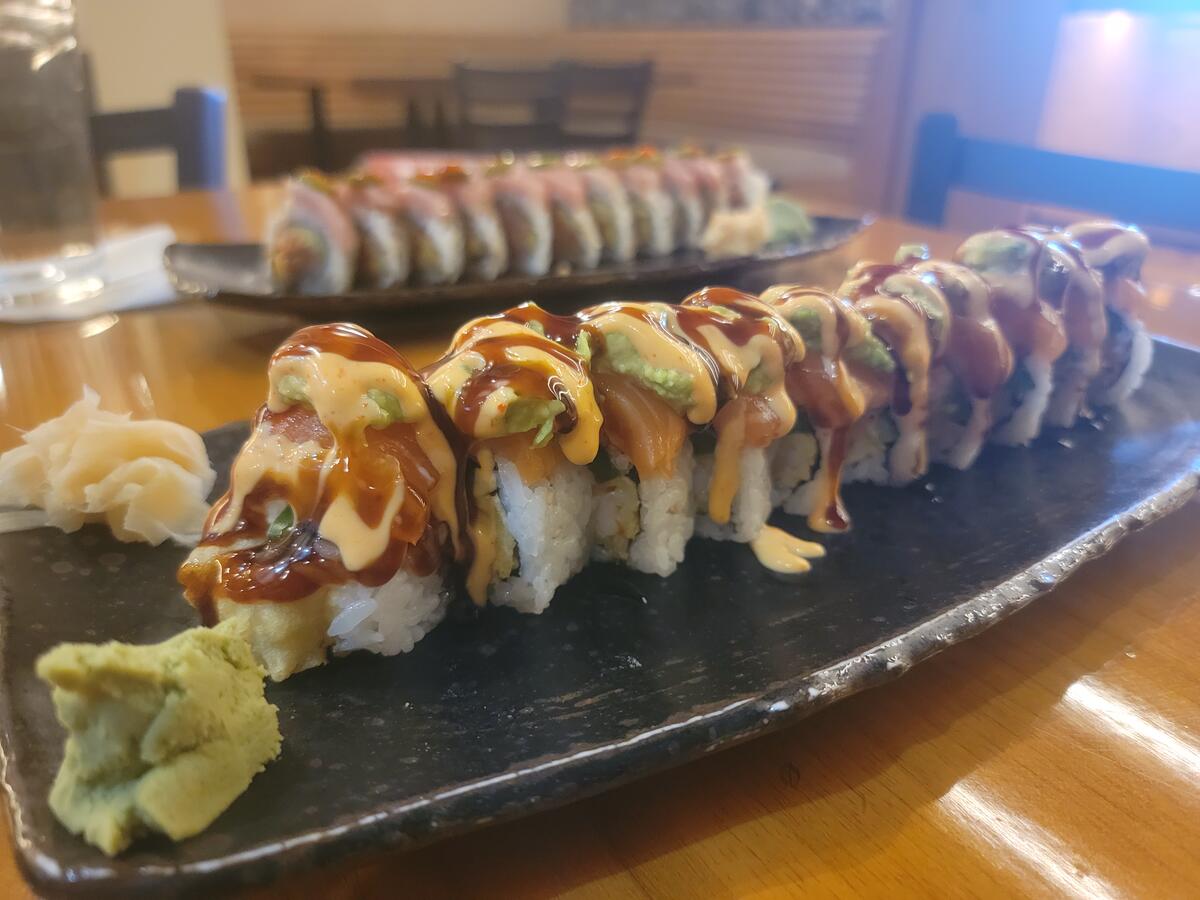 Artfully plated sushi rolls and nigiri at Jinbeh Japanese Restaurant