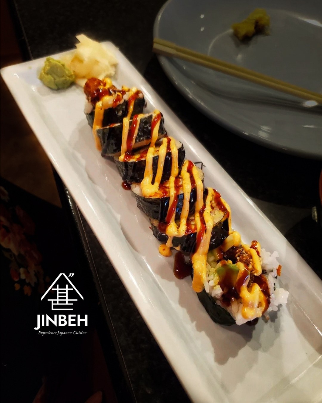 Branded sushi roll at Jinbeh
