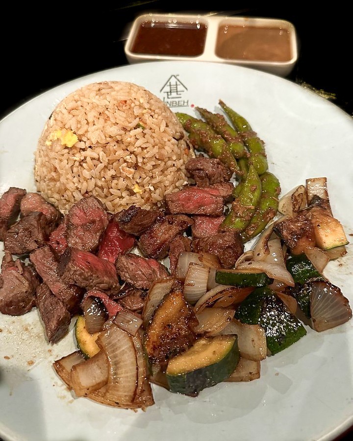Hibachi steak with fried rice, grilled vegetables, and dipping sauces at Jinbeh