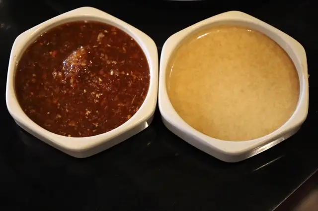Jinbeh house-made dipping sauces, spicy chili sauce and signature yum yum sauce made fresh daily from scratch
